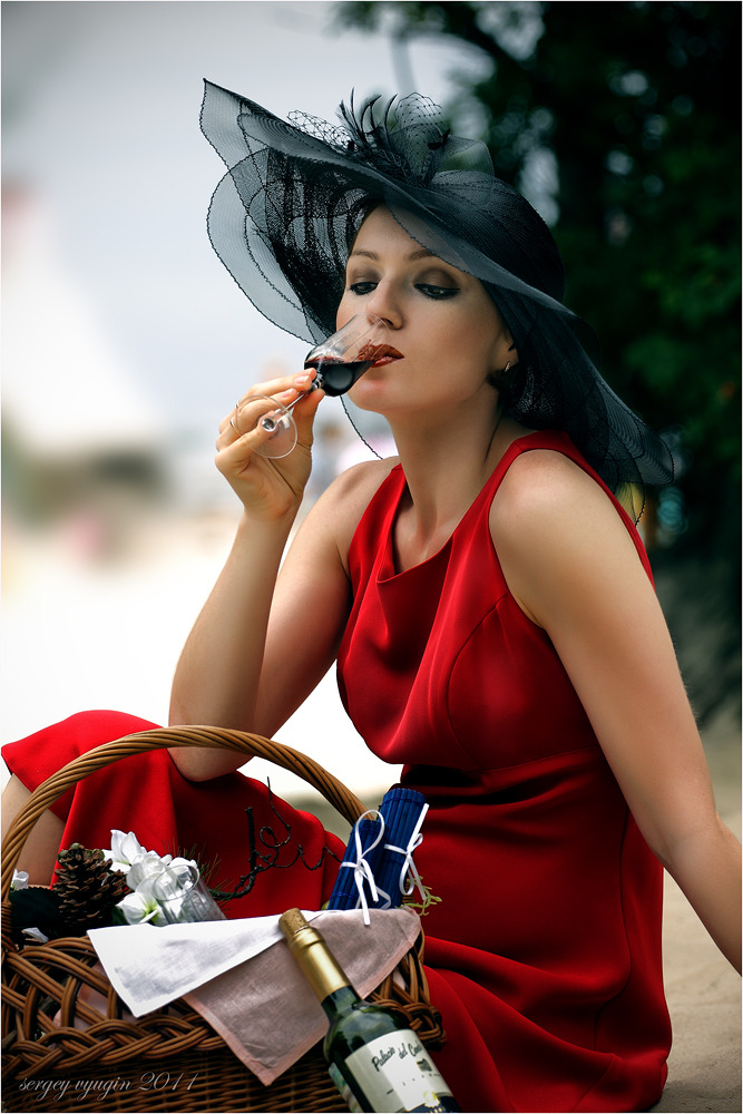 Girl drinking wine | wine, red dress, cartweel hat, enviromental portrait