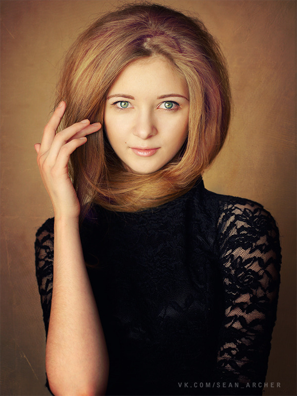 Girl with strange hair-do | strange hair-do, black sweater, blue eyes, portrait