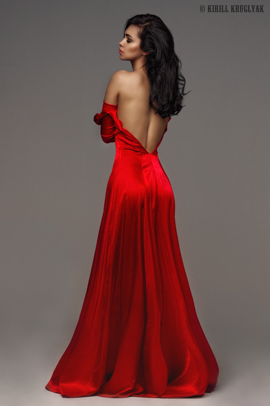 Girl takes her red dress off | beautiful girl, long red dress, dark hair, perfect skin, naked back