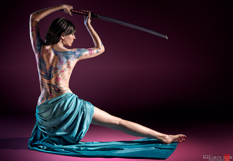 Tattoed girl with sword | tatoo , girl, sword