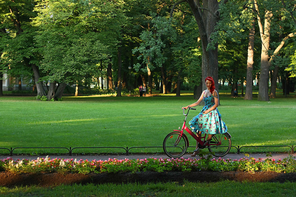 Bike girl | glamour, model, girl, park, trees, green grass, flowers, sunny day, red bike, dress